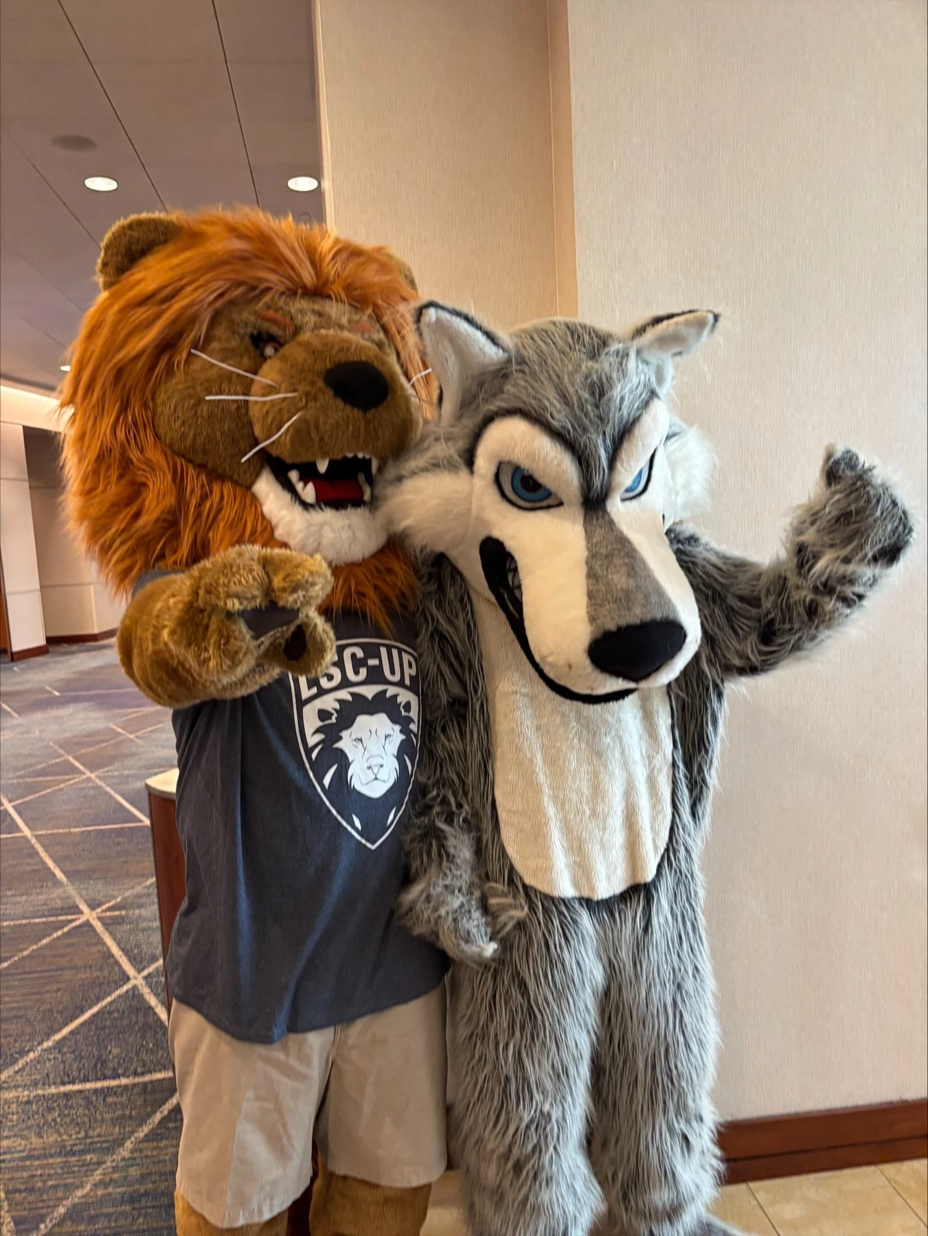Timberwolf posing with the LSC-University Park lion mascot